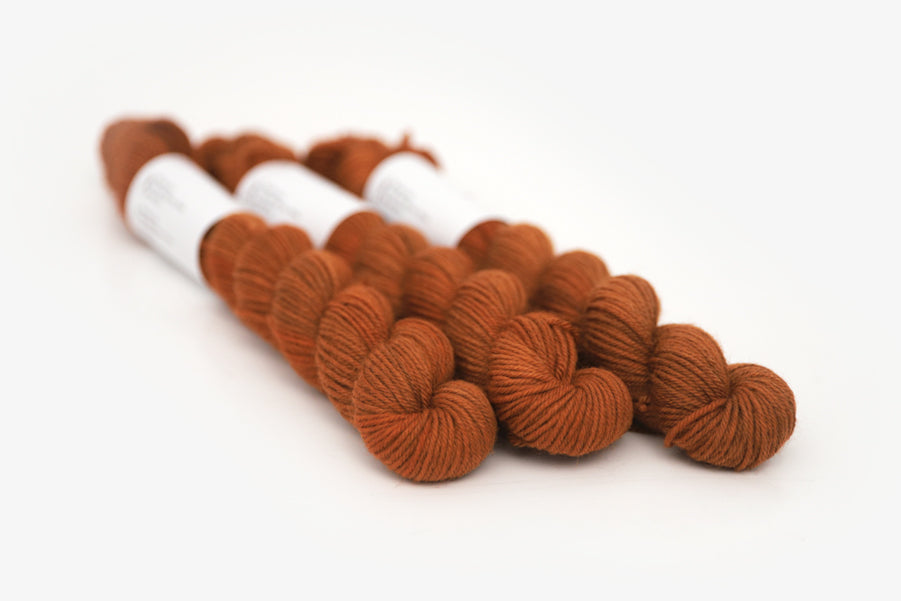 semisolid hand dyed pumpkin (dark burnt orange) phyllis sock mini yarn