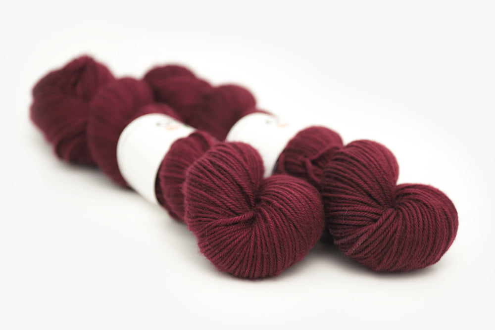 semisolid hand dyed sangria (dark wine burgundy red) dk yarn