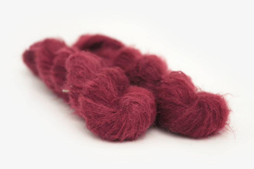 semisolid hand dyed sangria (dark wine burgundy red) alpaca suri lace yarn