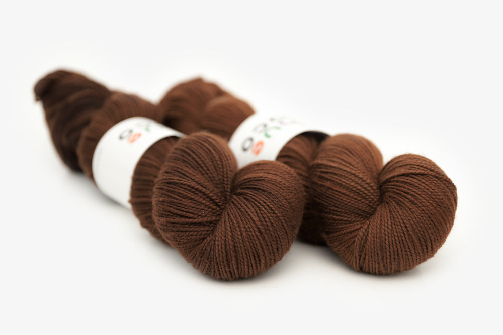 semisolid hand dyed dark warm brown merino sock yarn
