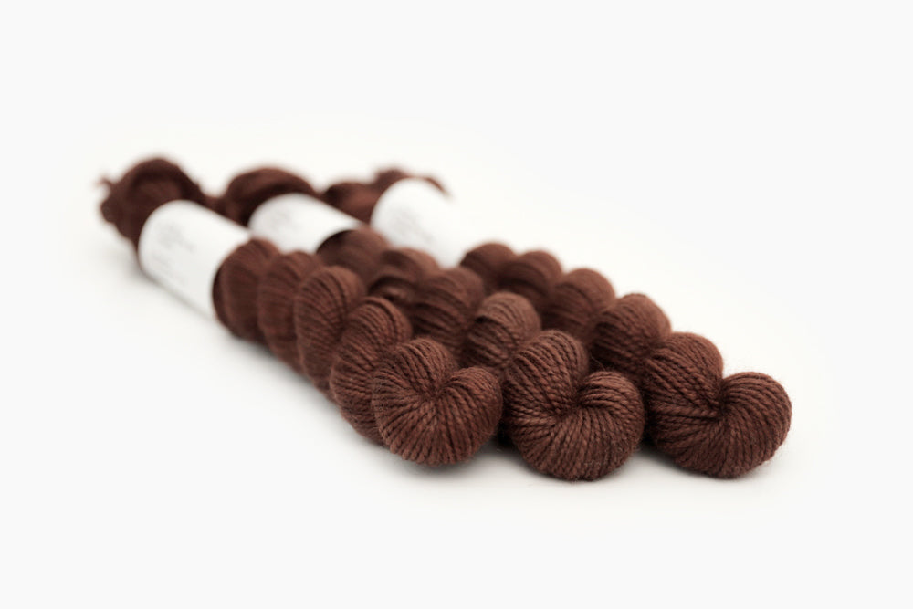 semisolid hand dyed dark warm brown merino sock mini yarn