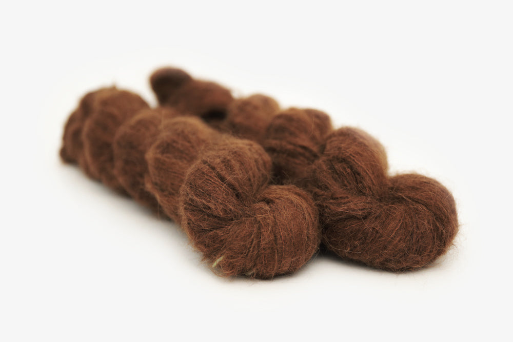 semisolid hand dyed dark warm brown alpaca suri lace yarn