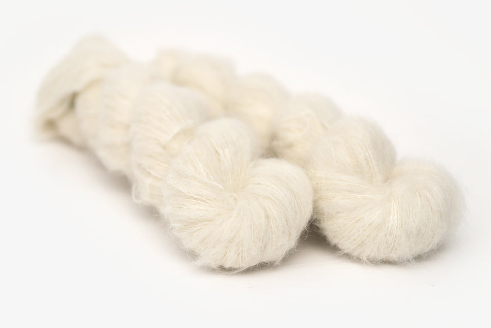 semisolid hand dyed ivory white alpaca suri lace yarn