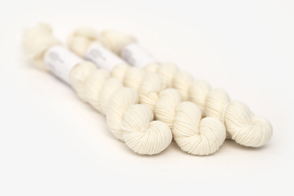 semisolid hand dyed ivory white phyllis sock mini yarn