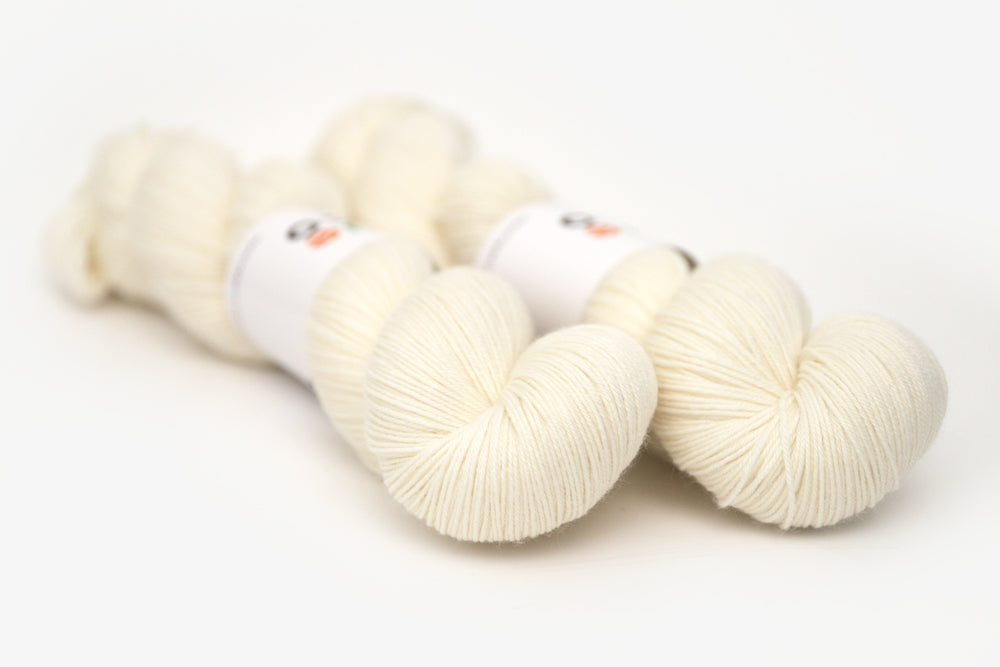 semisolid hand dyed ivory white phyllis sock yarn