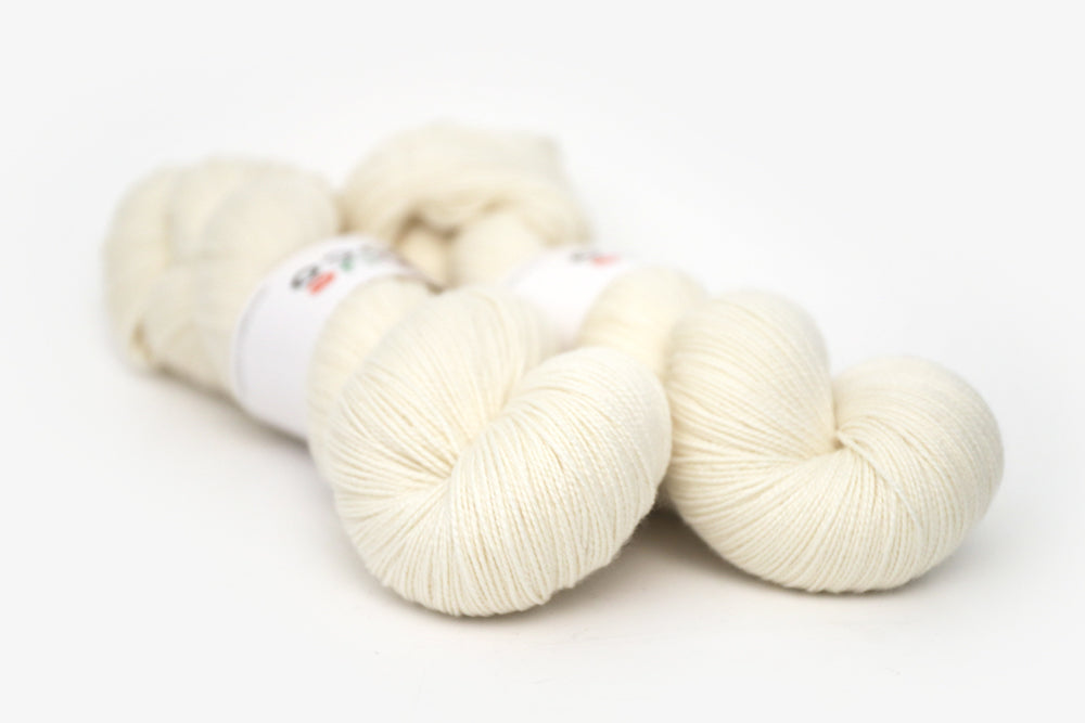semisolid hand dyed ivory white spun xl yarn