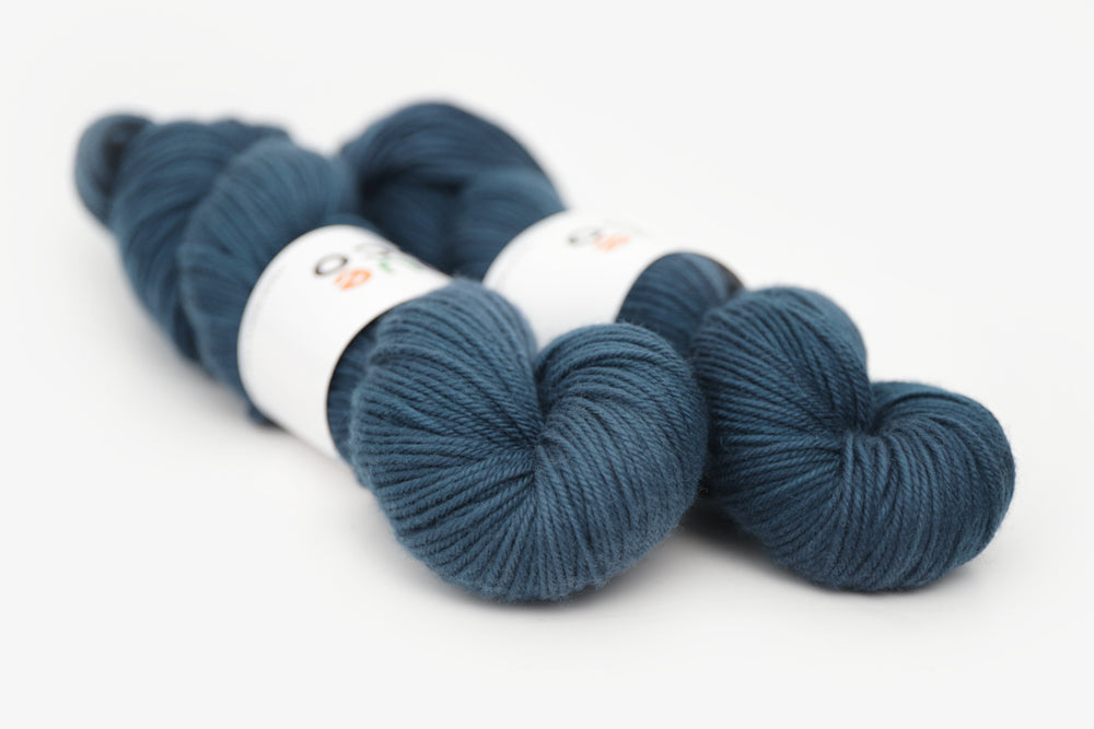 semisolid hand dyed spruce (dark teal green) dk yarn