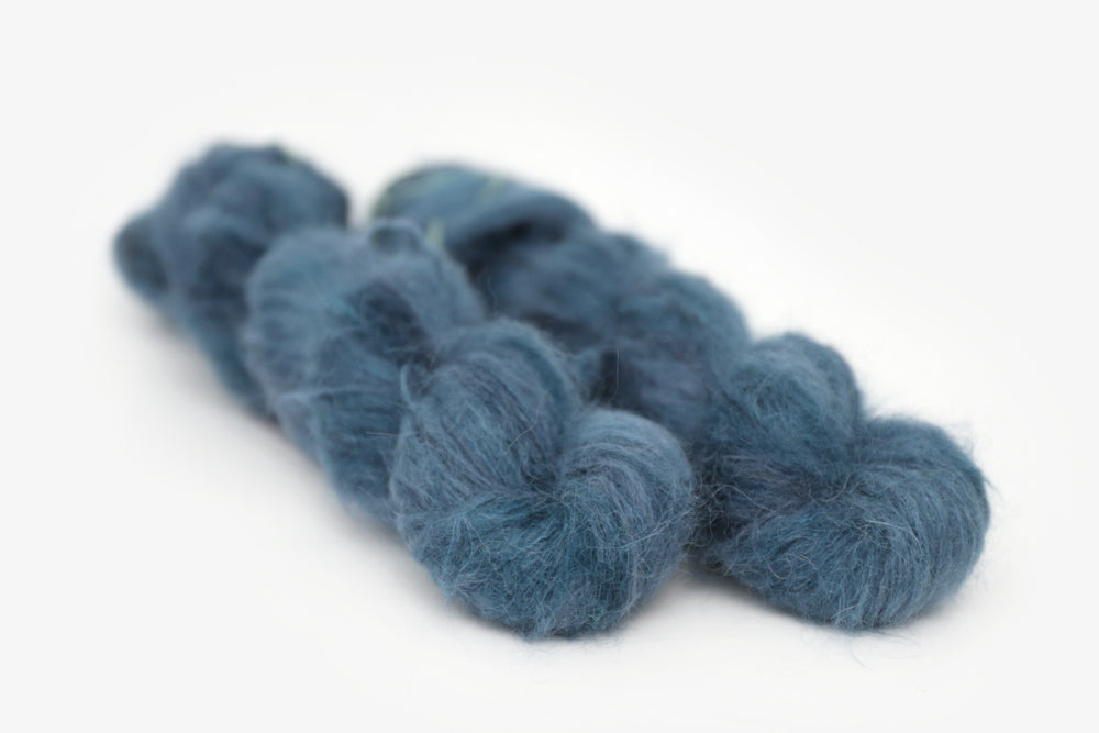 semisolid hand dyed spruce (dark teal green) alpaca suri lace yarn