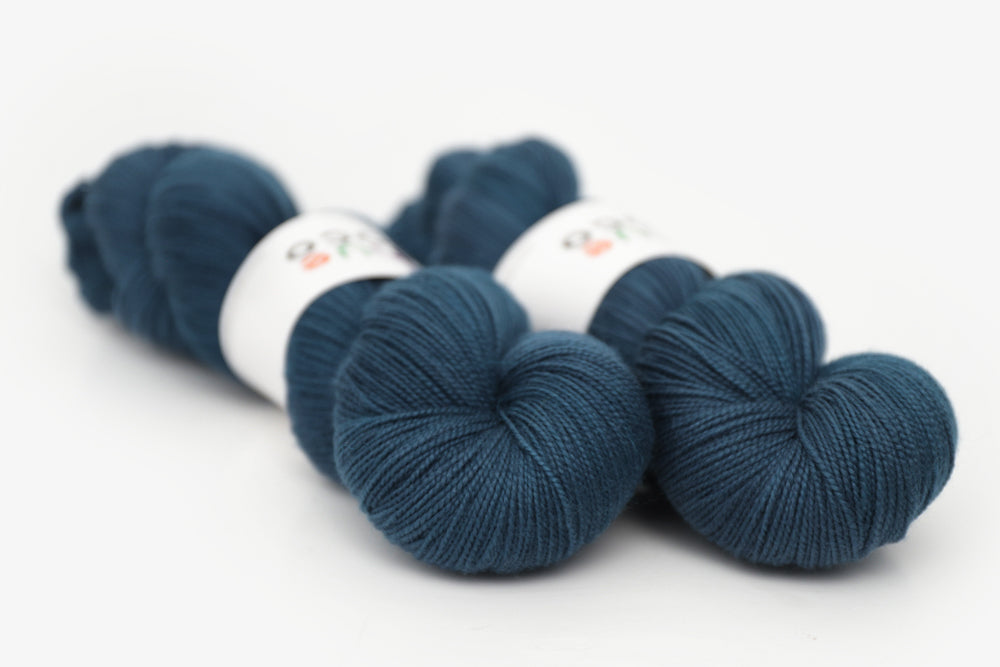 semisolid hand dyed spruce (dark teal green) spun xl yarn