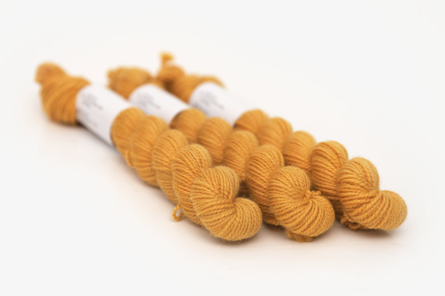 semisolid hand dyed squash (mustard gold yellow) merino sock mini yarn
