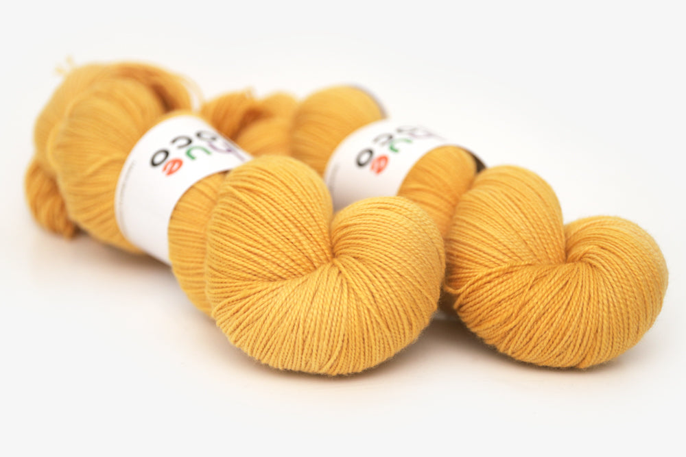 semisolid hand dyed squash (mustard gold yellow) spun xl yarn 