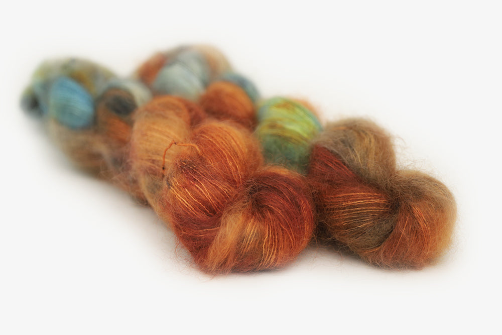 speckled hand dyed burnt orange teal green mohair lace yarn